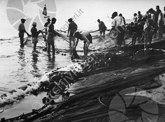 Pescatori Reti da pesca barca spiaggia riva